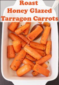 Roast honey glazed tarragon carrots in a serving dish.