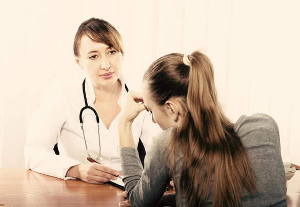 Doctor with female patient